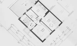 Projekt budynku gospodarczego 35m2: rzut parteru z kuchnią, łazienką, salonem i sypialnią. Widoczna taras i wymiary pomieszczeń.