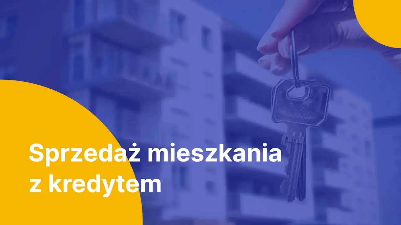 Klucze do mieszkania na tle bloku. Czy można sprzedać dom z kredytem? Dowiedz się więcej.