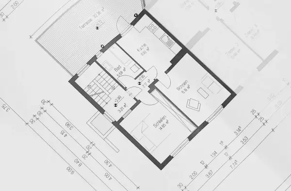 Projekt budynku gospodarczego 35m2: rzut parteru z kuchnią, łazienką, salonem i sypialnią. Widoczna taras i wymiary pomieszczeń.